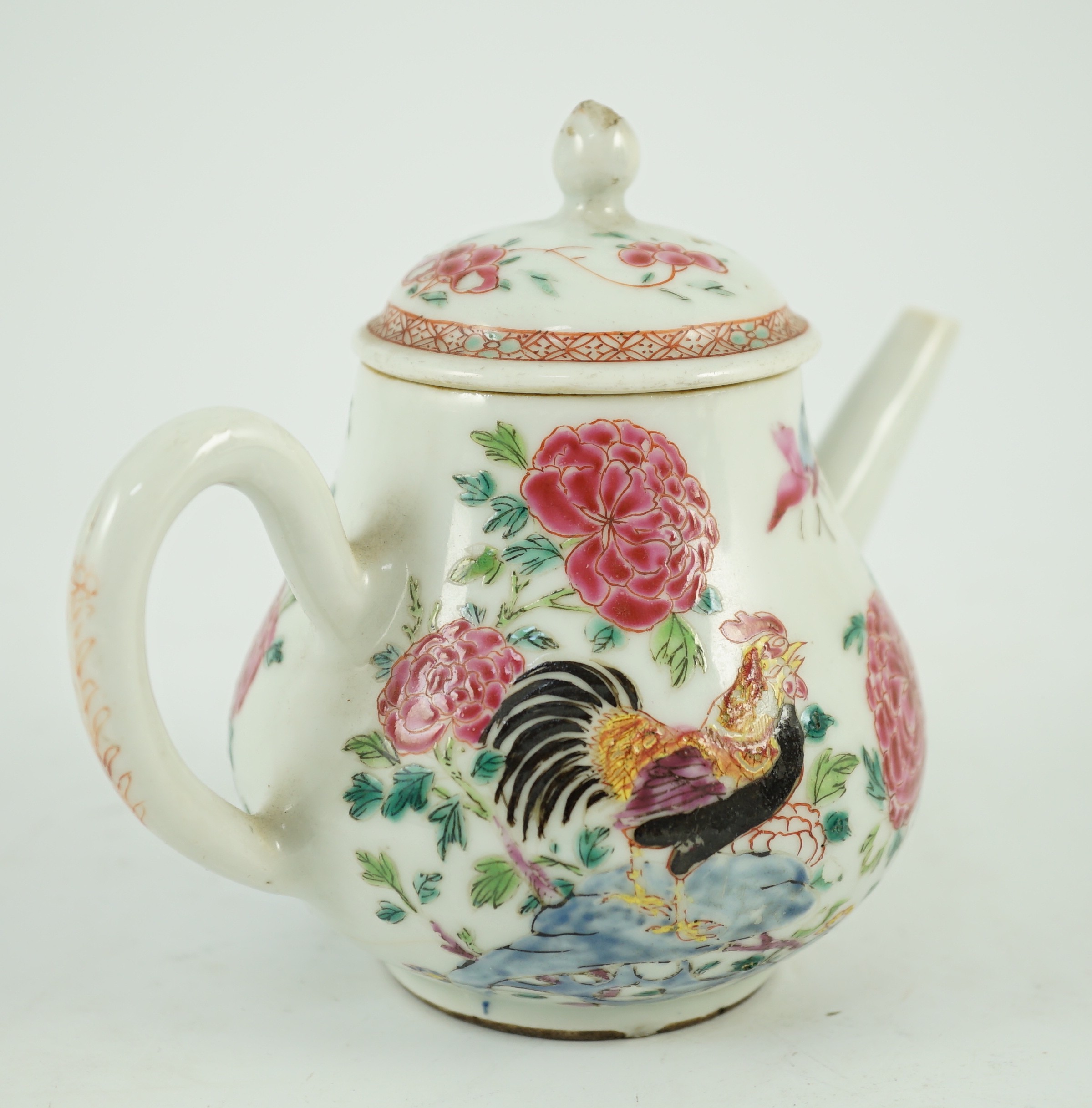 A Chinese famille rose ‘cockerel’ teapot, Yongzheng period, 12 cms high, 11.5cm high